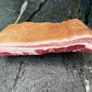 Premium Iberico pork belly with rich marbling, ideal for bacon, roasting, or braising. Fresh, never frozen. Approx. 5 lb.